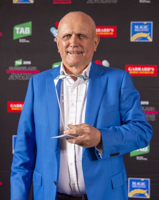Hall of Fame: Eddie Burke with the trophy presented for inductee Bore Head co-owned by his mother Carmel Burke, Brisbane, and her brother Bob Chaplain, Cloncurry. Picture: Racing Queensland