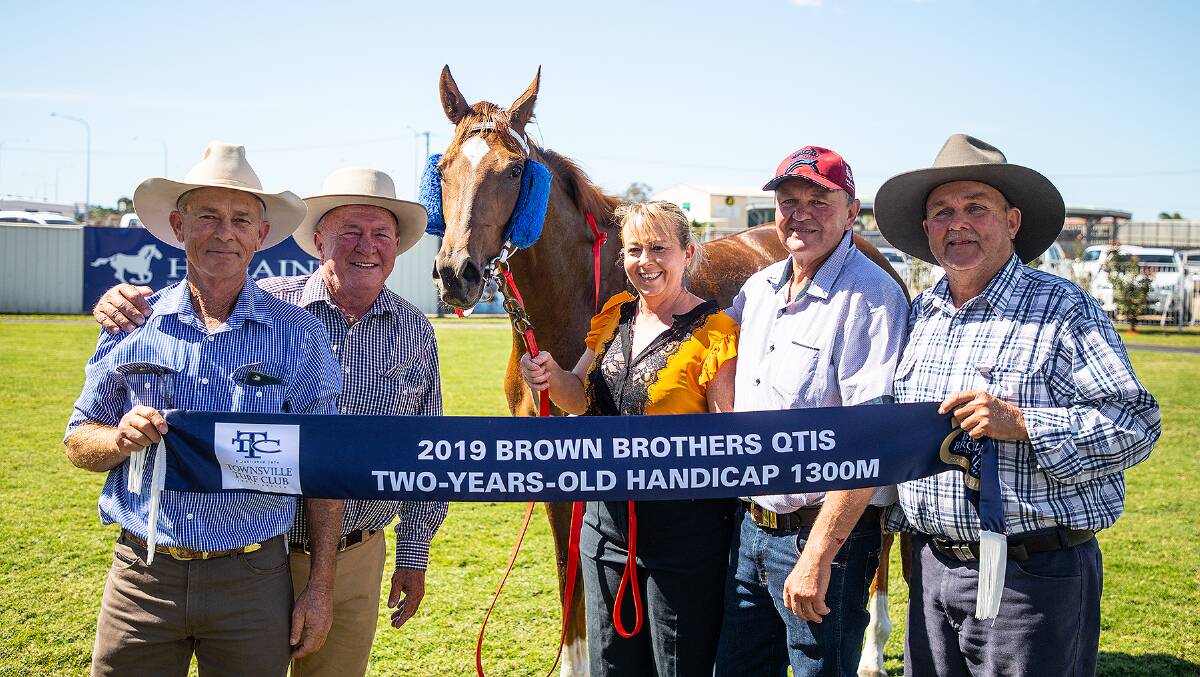 Delighted connections after Dawson Delight won a 1300m 2YO race on Townsville Cup day were (from left): John Howard, Stewart Nobbs, Kylie Welburn (strapper), Garnett Taylor (trainer) and Clive Long. Picture: Mike Mills