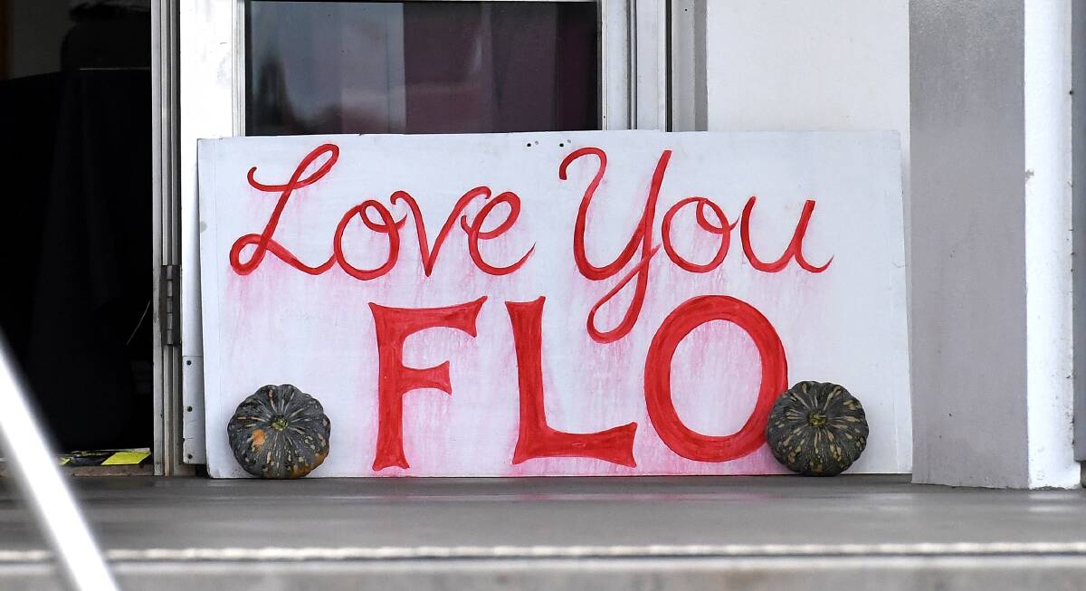 A sign saying "Love you Flo" at the State Funeral for Lady Florence Bjelke-Petersen at Kingaroy on January 4. 