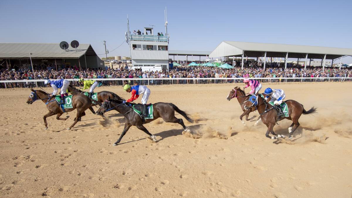 More than 8000 racegoers watched French Hussler win last year's Birdsville Cup as they partied and punted at its annual iconic two-day race meeting. This year's event has been cancelled due to COVID-19 pandemic restrictions. Picture: Racing Queensland

