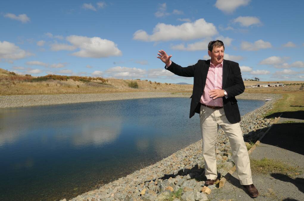 Orange (NSW) mayor Reg Kidd at the stormwater holding pond, part of a water harvesting and filtration system through natural wetlands, that now provides up to 25 per cent of the city's annual water supply.