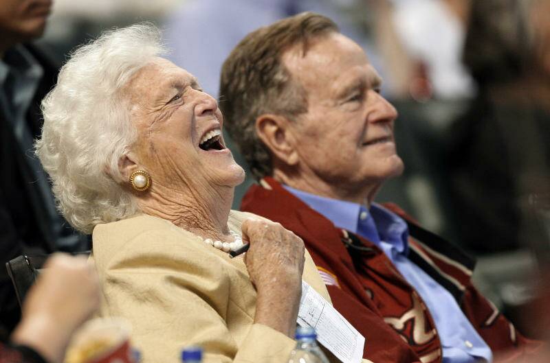  Barbara Bush laughs alongside former President George H.W. Bush. Later in the year the former President died.