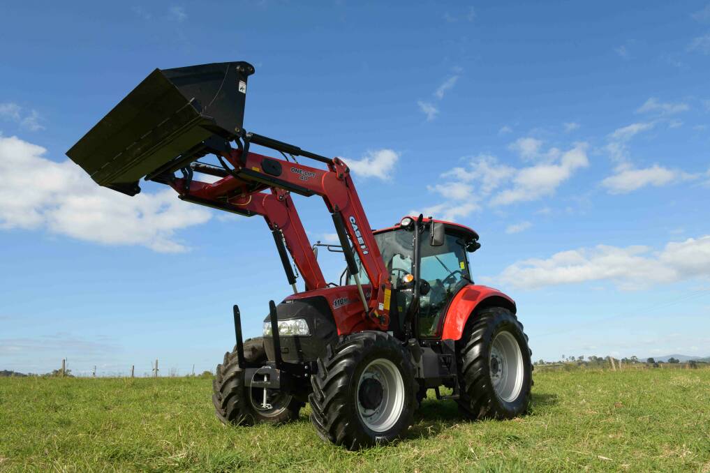 READY FOR WORK: The new Farmall M utility tractor is designed for a wide range of jobs on farms including dairy and beef operations. 