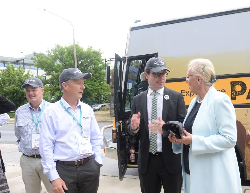 OFF THE BUS: Former Sheep Producers Australia CEO, Graham Smith (second from left) with federal Water Resources and Drought Minister, David Littlleproud, and retiring Meat and Livestock Australia chairman, Michele Allen, at the recent Red Meat 2019 conference in Tamworth. SPA chairman, Chris Mirams, is on the far left. 