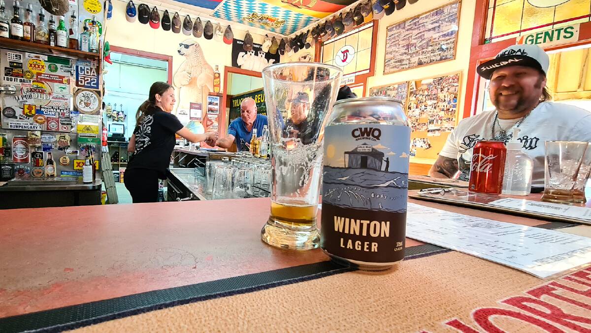 Tourists are walking across the road from the Tattersalls Hotel in Winton to learn more about the William Mar's fruit shop, which is featured on the beer can. 