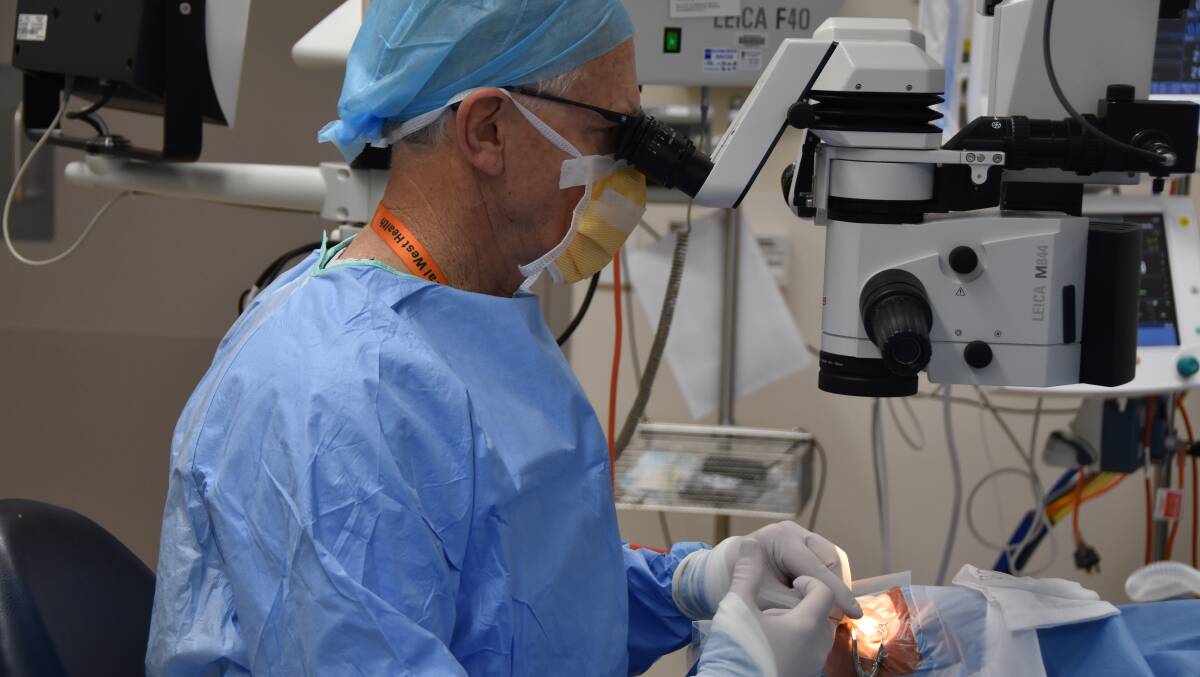Dr Bill Glasson performs surgery at Longreach Hospital.
