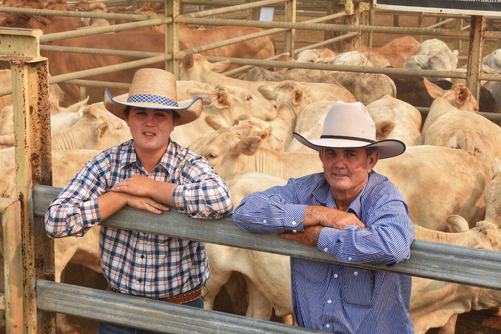 Son and father, Jonty and Shane Benney, Merrigang, Clermont, sold Charolais cross heifers, weighing 458kg, to make 194c/kg ($889/hd). Pictures by Ben Harden 