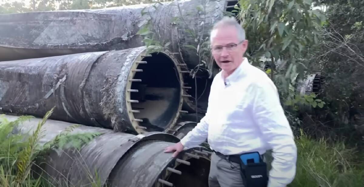 Columnist Nick Cater at the Kidner Contracting property at Ravenshoe, where the decommissioned Windy Hill turbine blades are stored. Image: Youtube 
