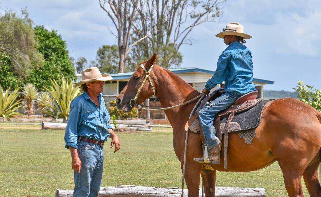 WPC head stockman Lawson Woodard with trainee stockman Christopher Doyle, 16, on horse back. Picture: Ben Harden 