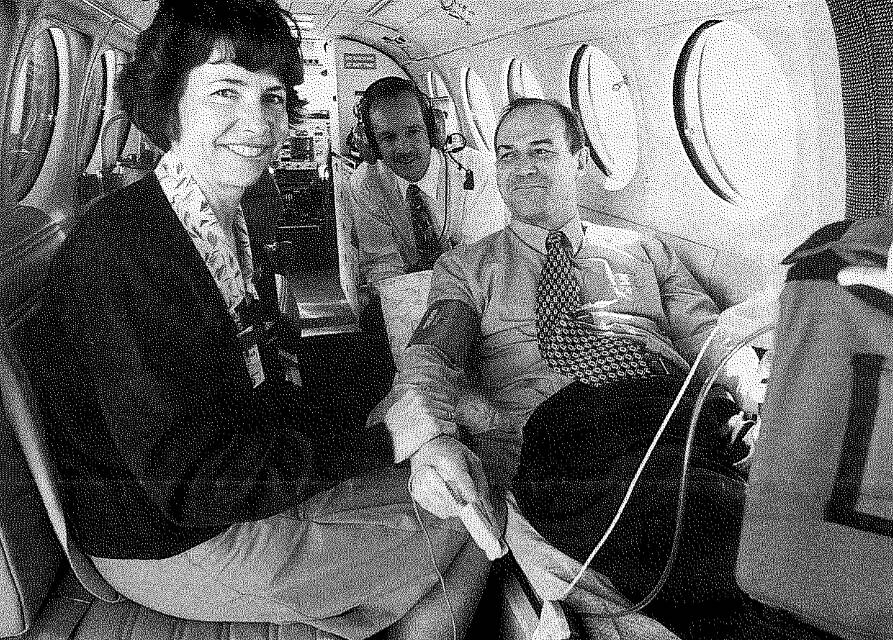 Then-Health Minister Jim Elder tries out the new "Lifeport" system with help from senior Brisbane flight nurse Maree Cummins and aviation manager Gaeme Maughan in 1995. Picture: RFDS