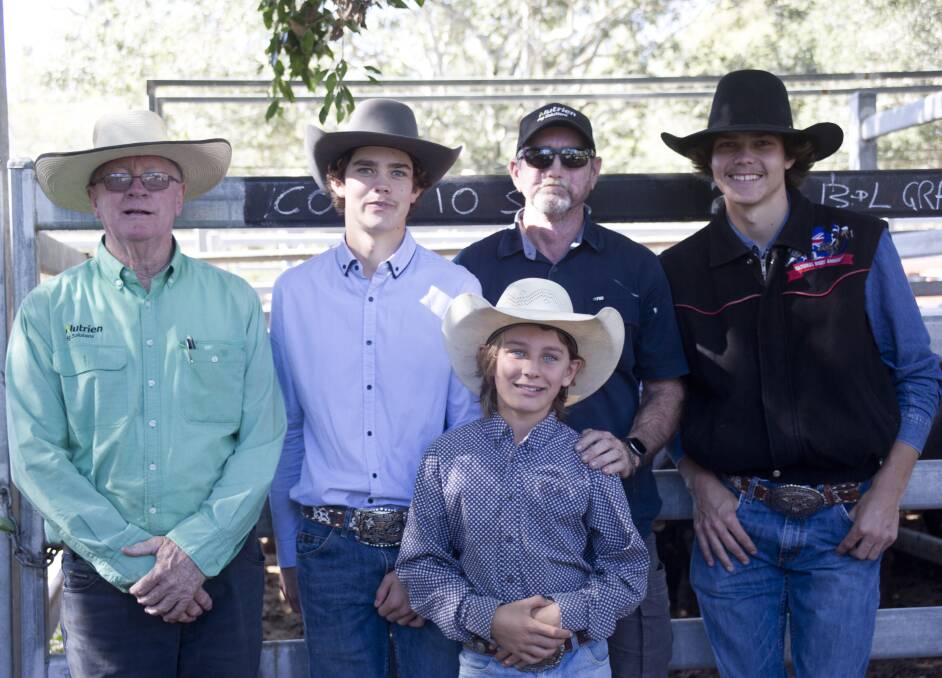 Nutrien's Michael Lynch, Jack Bode, Brett Grady, Ben Bode, and Rex Walker at the recent Miriam Vale Show sale where Mr Grady donated a steer to the boys for their trip. 