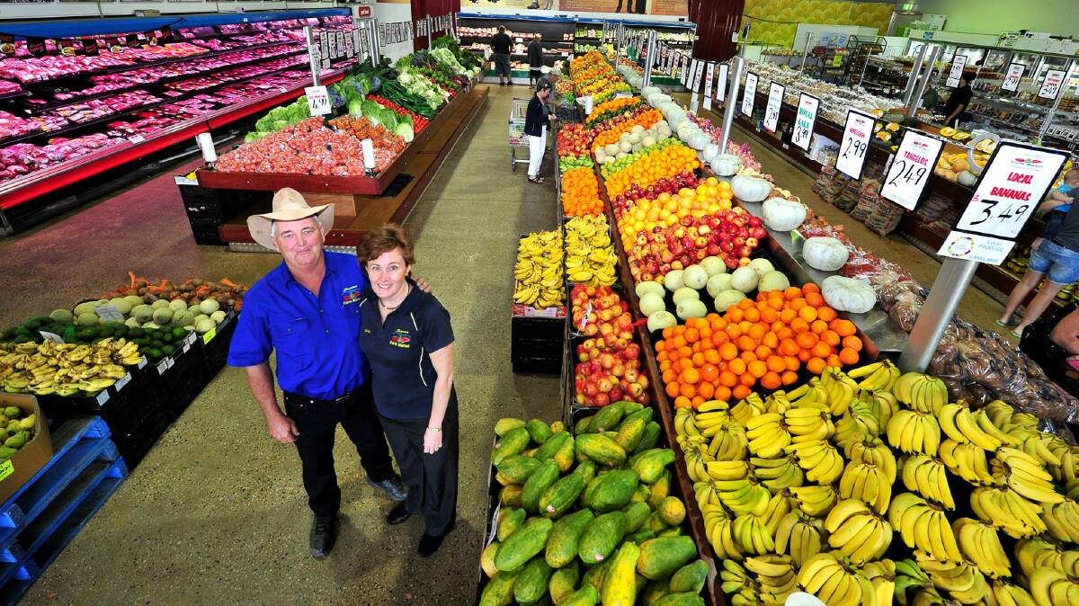 Jonsson's Farm Market owners Warren and Gail Jonsson at their wholesale and retail store in Cairns. 