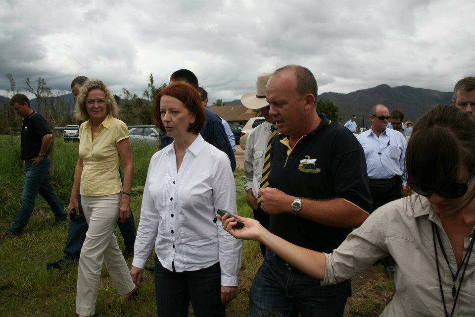 Former Prime Minister Julia Gillard arrives in Tully after Cyclone Yasi and is given a tour of Cameron Mackay's Banana farm, with Senator Jan McLucas. Picture: ABGC
