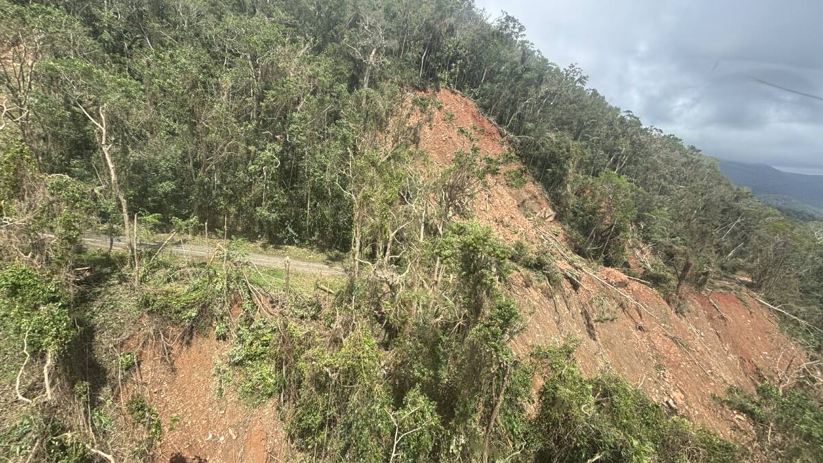 A landslide caused by Tropical Cyclone Jasper swept away the road on Noah's Range, isolating Cape Tribulation residents. Picture supplied.