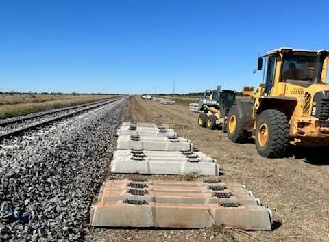 Queensland Rail work to replace sleepers damaged in the Nelia derailment. Photos: Queensland Rail.