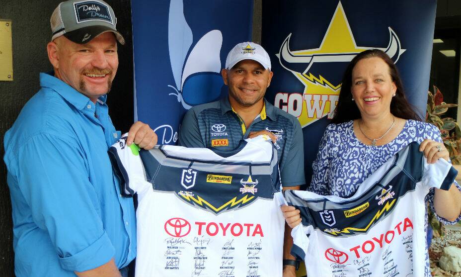 Dollys Dream founders, Tick and Kate Everett, with former Cowboys legend Matty Bowen (centre). Picture: supplied.
