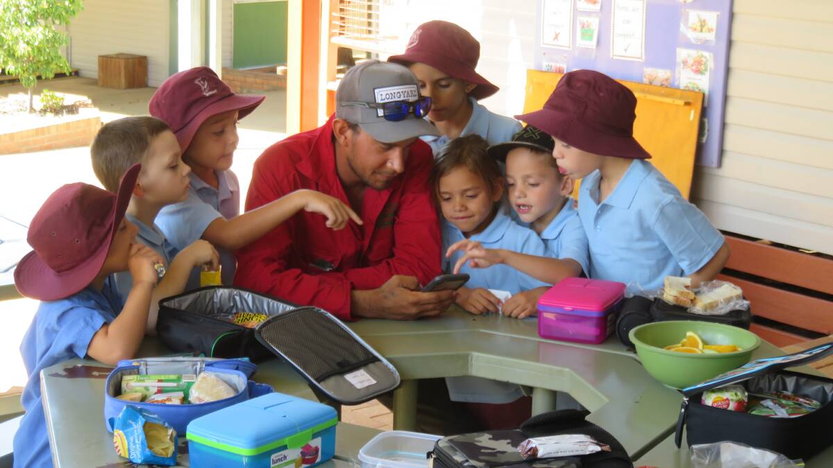 Stewart Foster shows school children what it looks like at the Gulf of Carpentaria. Photo supplied.