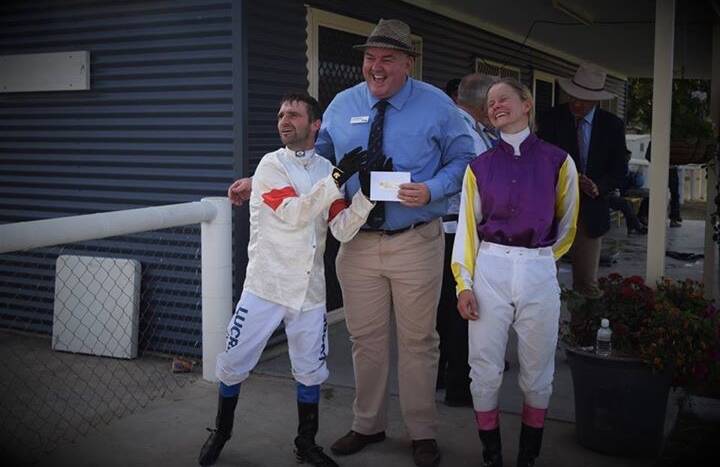 Member for Burdekin candidate Mike Brunker with jockeys Rob Faehr and Katariina Aho after the dead heat in race 5 