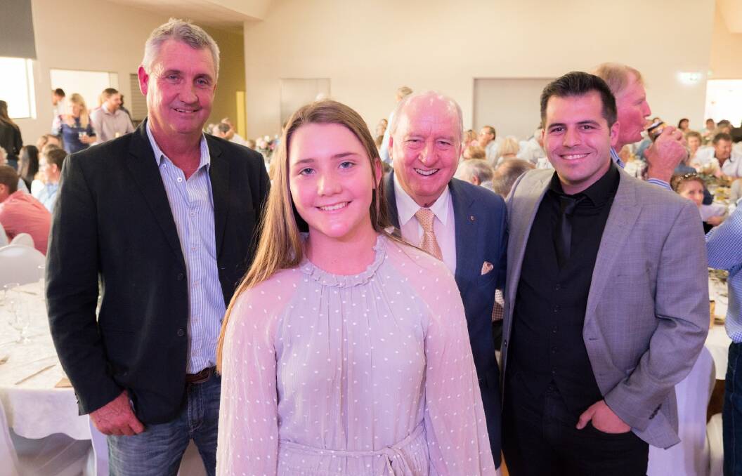 Flood recovery luncheon organiser Emily Curr, 16, stands with her father Marcus, radio presenter Alan Jones, and singer Mark Vincent. Photo: ABC North West Queensland.