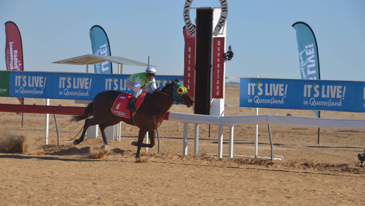 FASTER FELLOW: Roma trainer Craig Smith took out last year’s Birdsville Cup on the Adrian Coome-ridden Fast Fella. Photo: Derek Barry