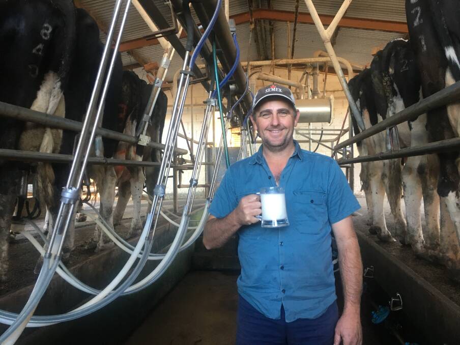 WORLD MILK DAY: Veresdale Scrub dairy farmer Rodney Teese with fresh milk.