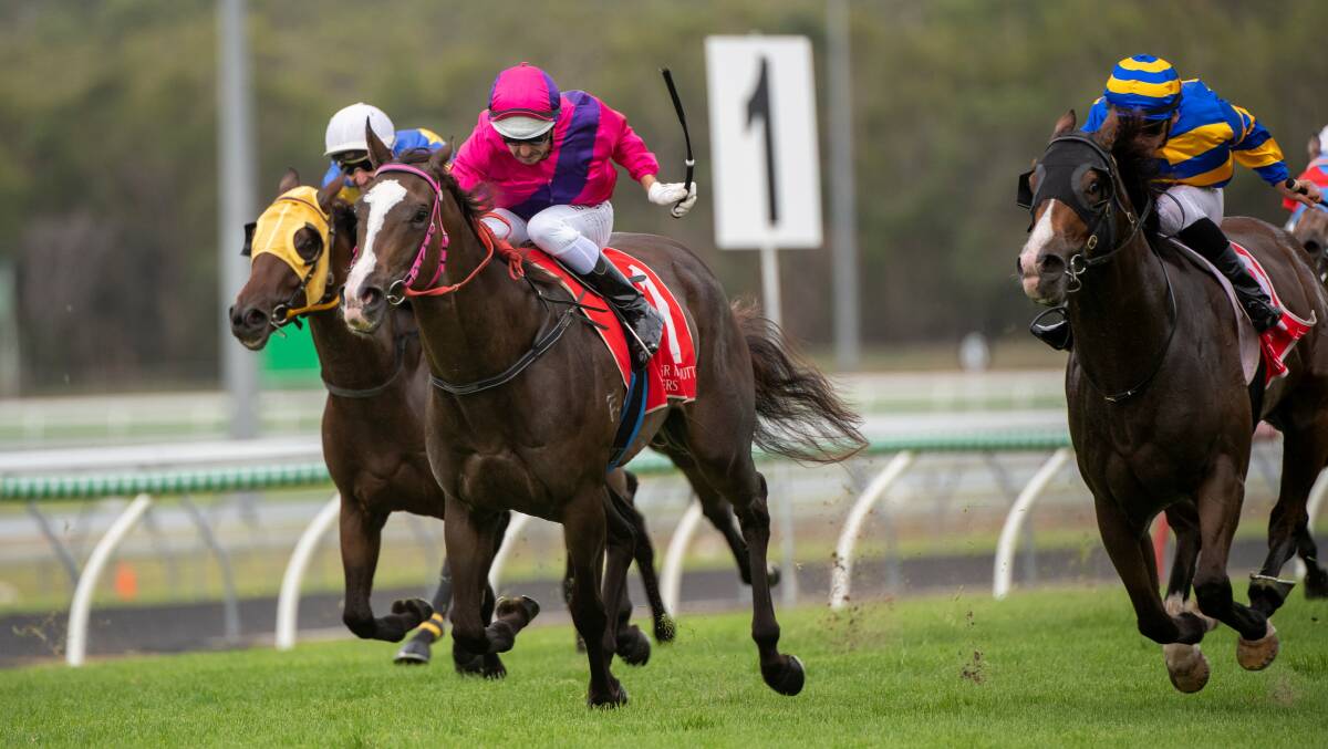Rockhampton 3YO filly Better Reflection (cerise, purple sash) ridden by Brad Stewart takes the lead to win a 1000m QTIS 3YO handicap at Corbould Park on the Sunshine Coast. Picture: Racing Queensland