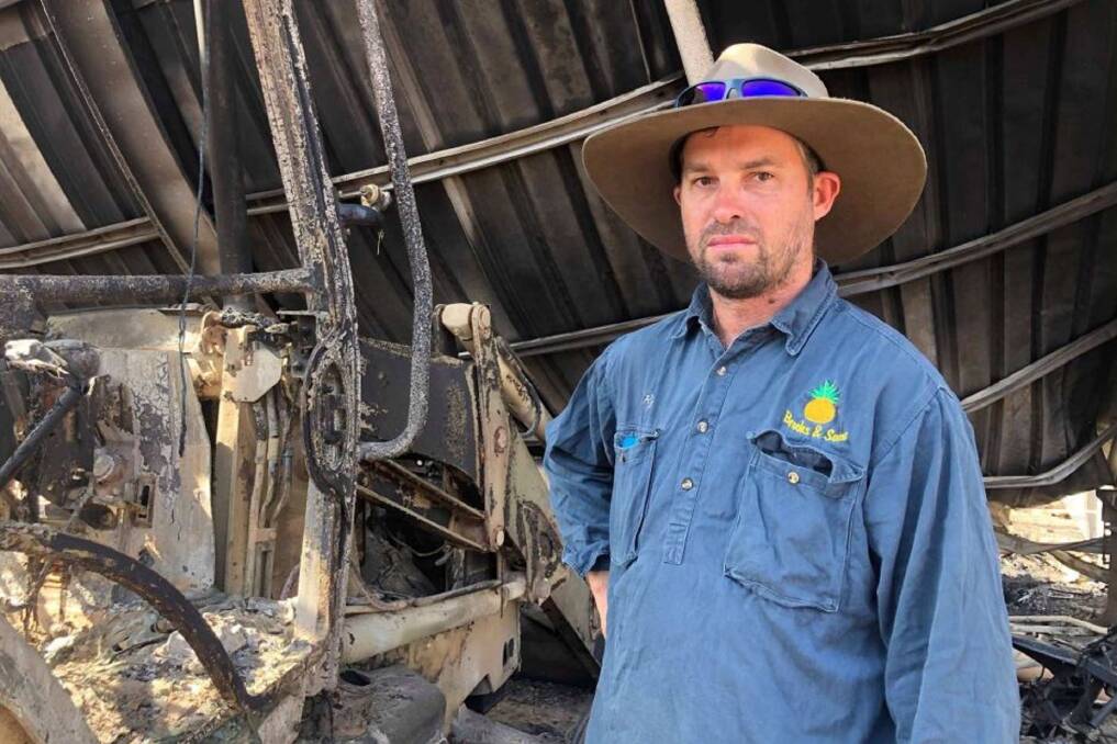 Ryan Brooks and his brother Jake are pushing forward with their harvesting plans despite fire ravaging their Bungundarra farm. Picture: ABC