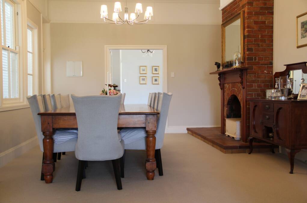 The table at the centre of the formal dining room is scored where Prue's grandfather, who was a tailor, marked out material. 