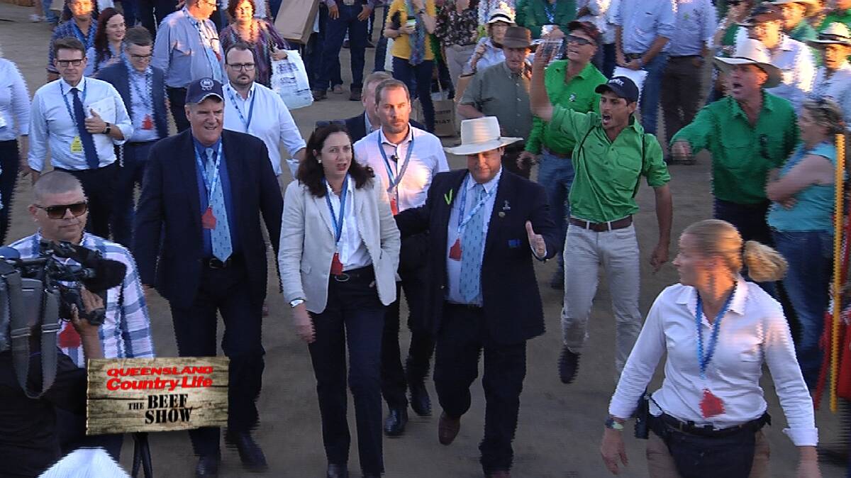Premier Annastacia Palaszczuk is escorted to the event by Beef Australia chairman Blair Angus. 