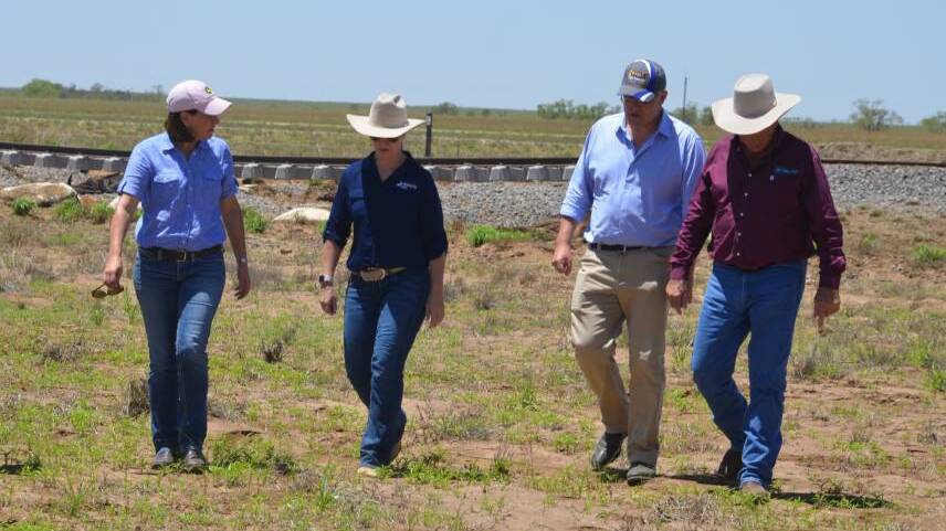  Queensland opposition leader, Deb Frecklington, left, and Prime Minister, Scott Morrison, second right, inspect flood damage in the Julia Creek region with McKinlay and Richmond mayors, Belinda Murphy and John Wharton. Picture - Derek Barry.