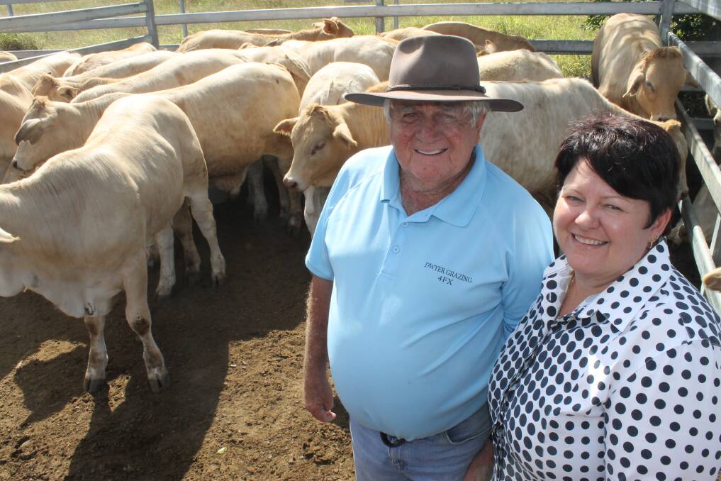 Donna McInally, Monto Cattle and Country and Harold Dwyer, Biggenden with Reserve Champion Pen of Steers at Monto's Charbray Show Sale.