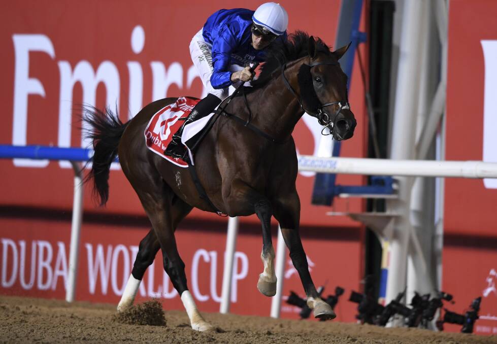 Jockey Christophe Soumillon reacts aboard Godolphin's Thunder Snow as he crosses the wire to win the $10 million Group 1 Dubai World Cup over 2000m in Dubai on March 31.. (AP Photo/Martin Dokoupil) 