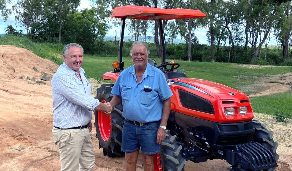 James Fisher (left) from NQ Ag in Tolga delivers another Kioti for Ian MacLaughlin. Picture: Supplied