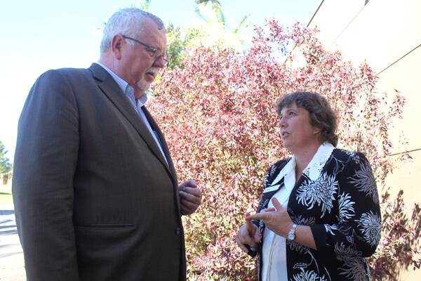 LNP candidate for Kennedy Noeline Ikin discusses northern economic development with Senator-in-Waiting Barry O’Sullivan in Atherton last week. 
