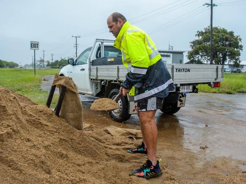 Many North Queensland communities will remain cut off after days of heavy rain. (Scott Radford-Chisholm/AAP PHOTOS)