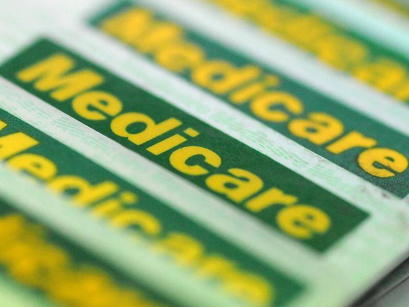 Pacific islanders working in Australia and their families will have access to Medicare. (Dave Hunt/AAP PHOTOS)
