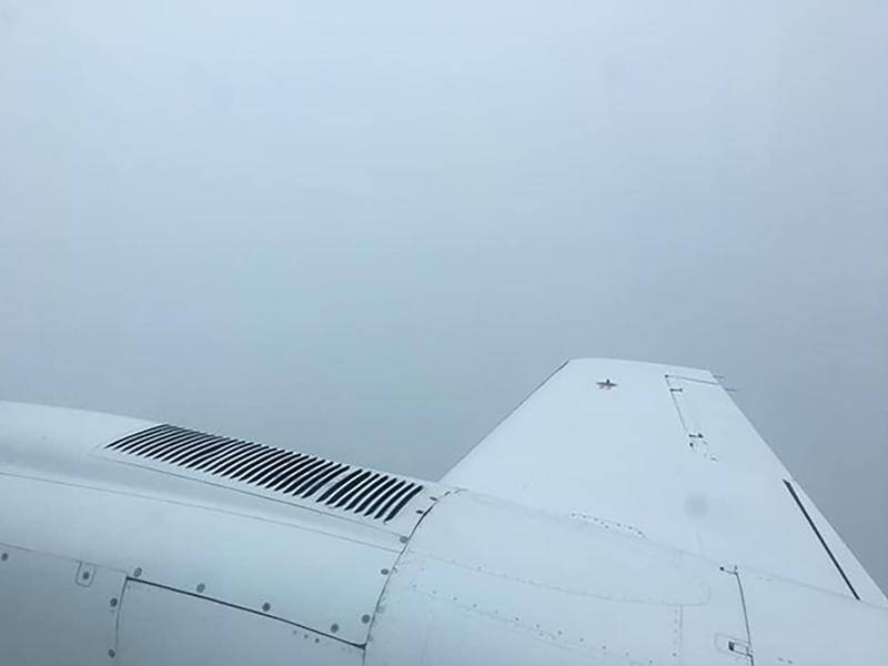 An image taken by a passenger on a plane that crashed into sand dunes shows visibility was low. (PR HANDOUT IMAGE PHOTO)