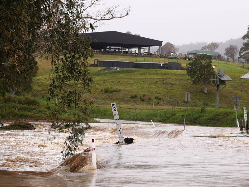 Residents in far north Queensland are bracing for heavy rainfall and flash flooding. (JASON O'BRIEN/AAP PHOTOS)