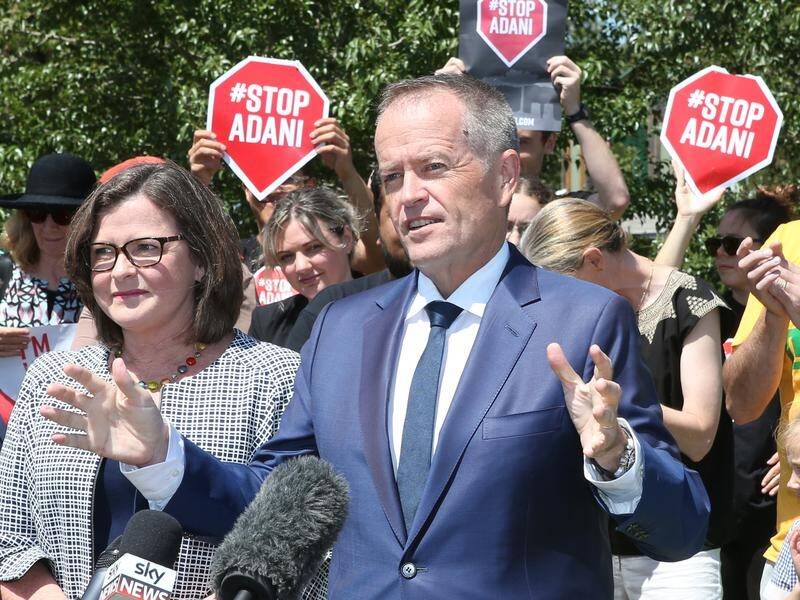 The government is demanding Bill Shorten reveal his position on the controversial Adani coal mine.