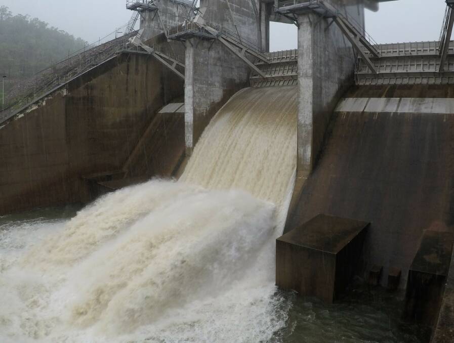 The spillway gates were opened at the Ross River Dam for the first time in almost five years. Photo: Phil Copp Photos.