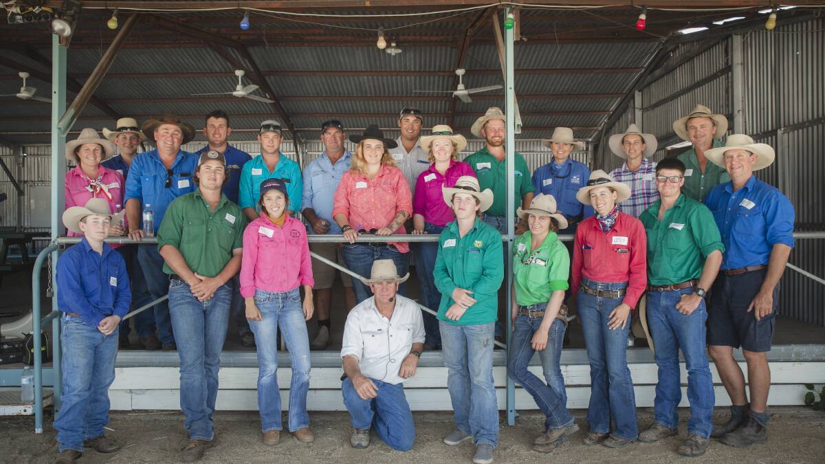 Graziers from 12 properties attended a low stress stock handling clinic at
the Bowen River showgrounds  to learn the principles of good stock handling and low stress concepts with leading educator and cattleman Jim Lindsay (kneeling front).
