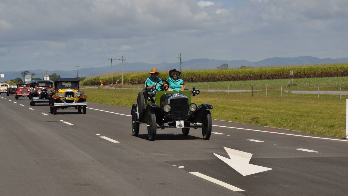 Vintage cars took a lap on the new Mackay Ring Road to celebrate its opening.