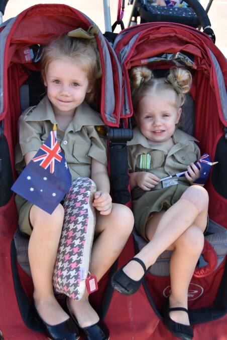 Rain is unlikely to deter crowds for paying their respects across the north, including kids like Piper and Kennedy Ver Hoef, who attended the Thuringowa parade last year while waiting for their soldier dad Corporal Daniel Ver Hoef, 3CSR, to return from deployment.