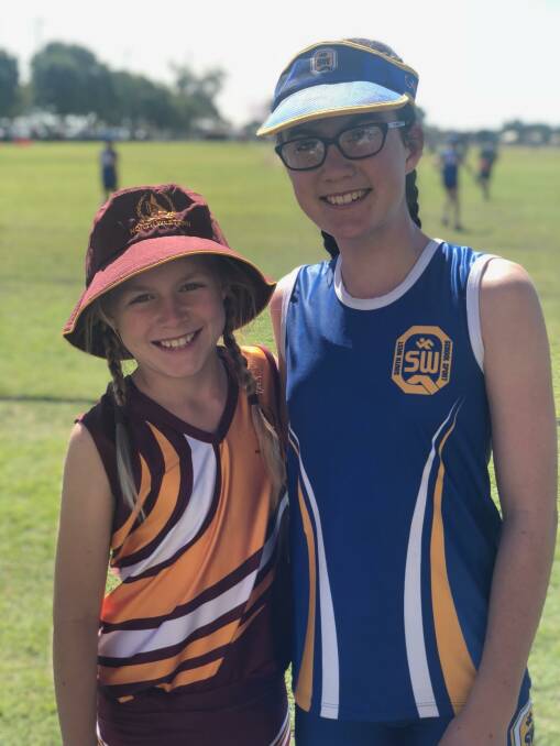 Amy Bellingham and Darcy Persse at the touch football girls state trials in Bundaberg.