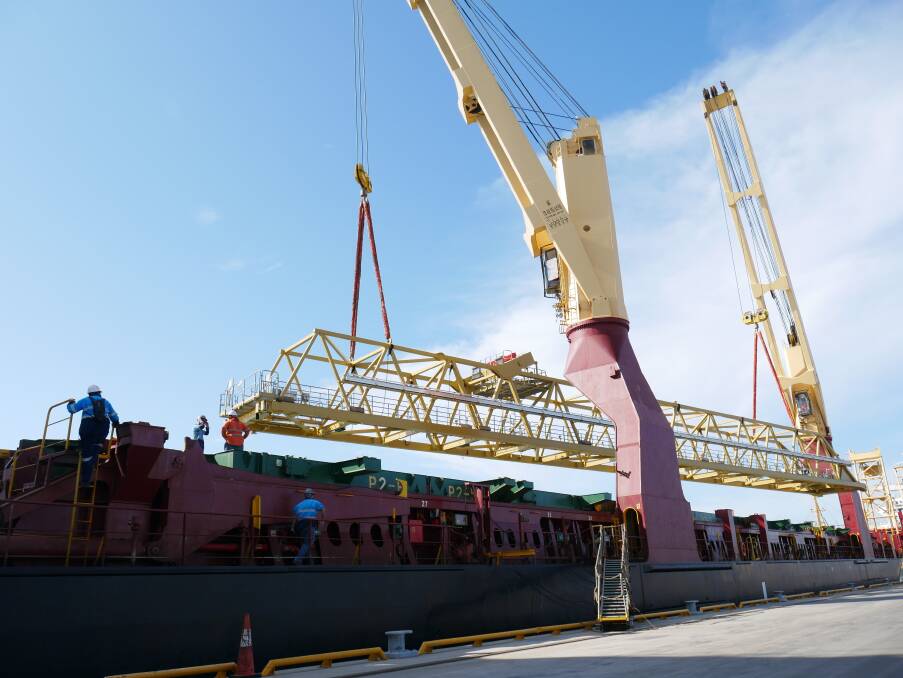 The crane was unloaded piece by piece at the Port of Townsville and will take several months to assemble.