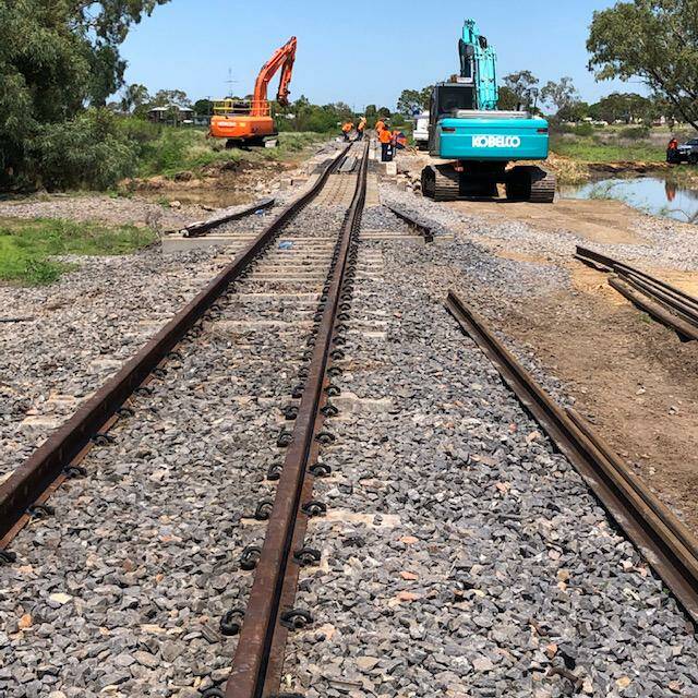 Repairs being undertaken on the Mount Isa to Townsville railway line earlier this year.