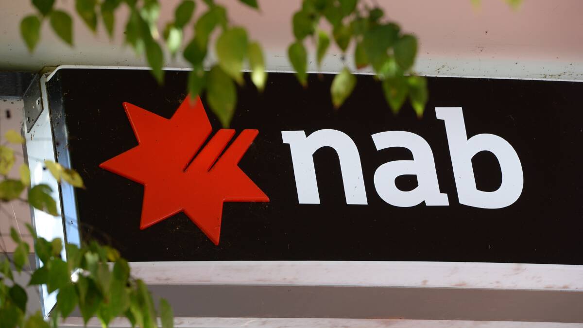NAB is reducing branch opening hours in 23 Queensland regional centres, saying people are moving toward online and telephone banking.