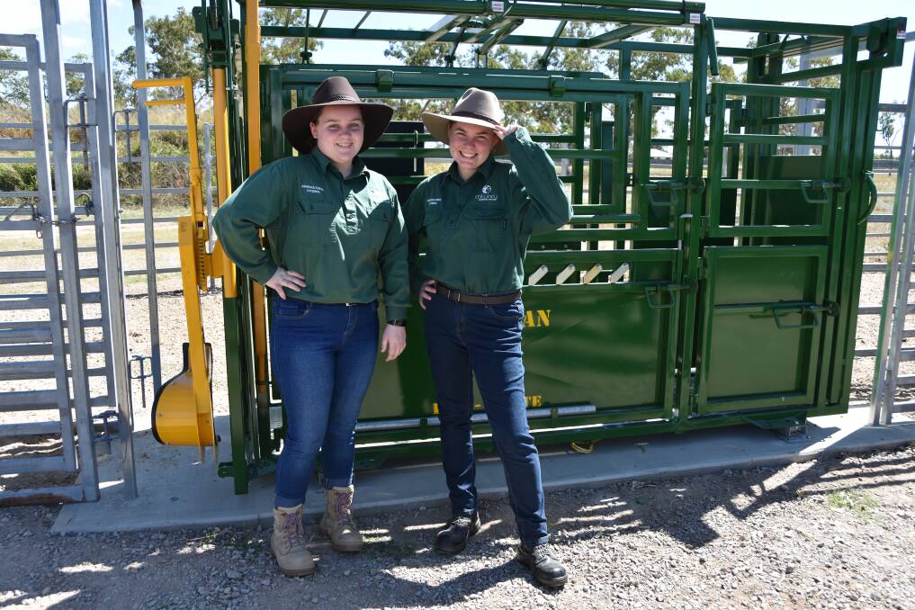 Calvary Christian College year 11 students Grace Britton and Breanna Stockdale are part of the school's agriculture program.
