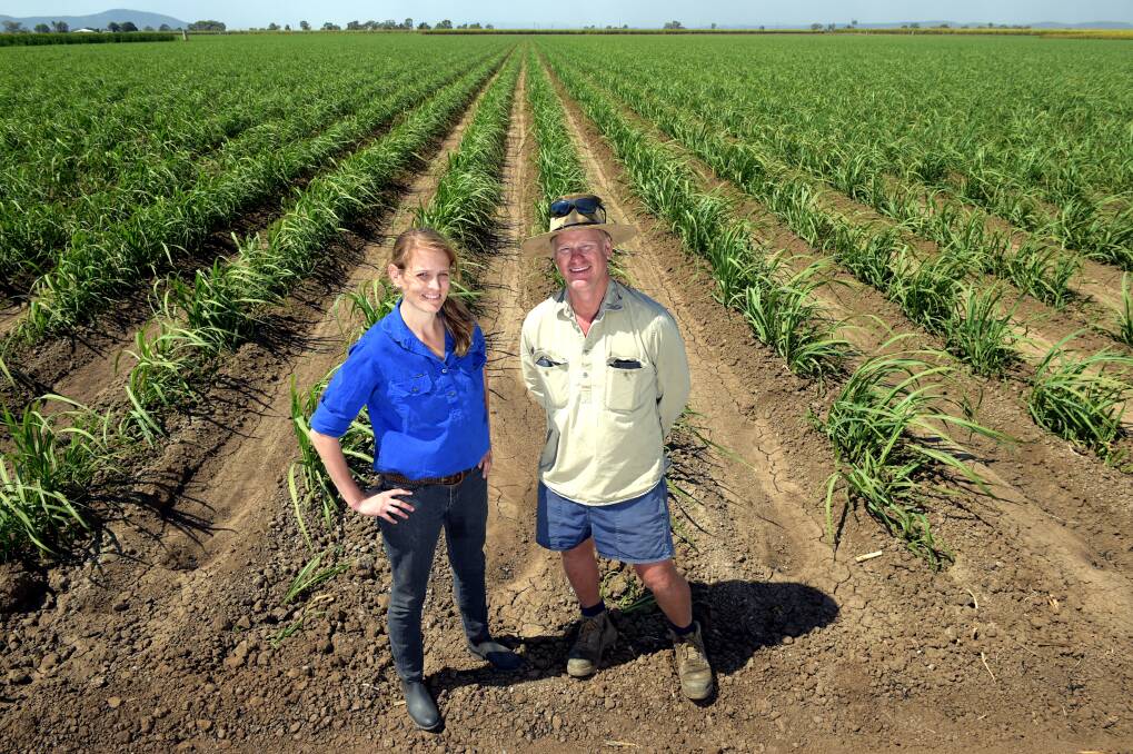 NQ Dry Tropics Project Officer Shakira Todd and cane grower Eric Barbagallo on the Burdekin.