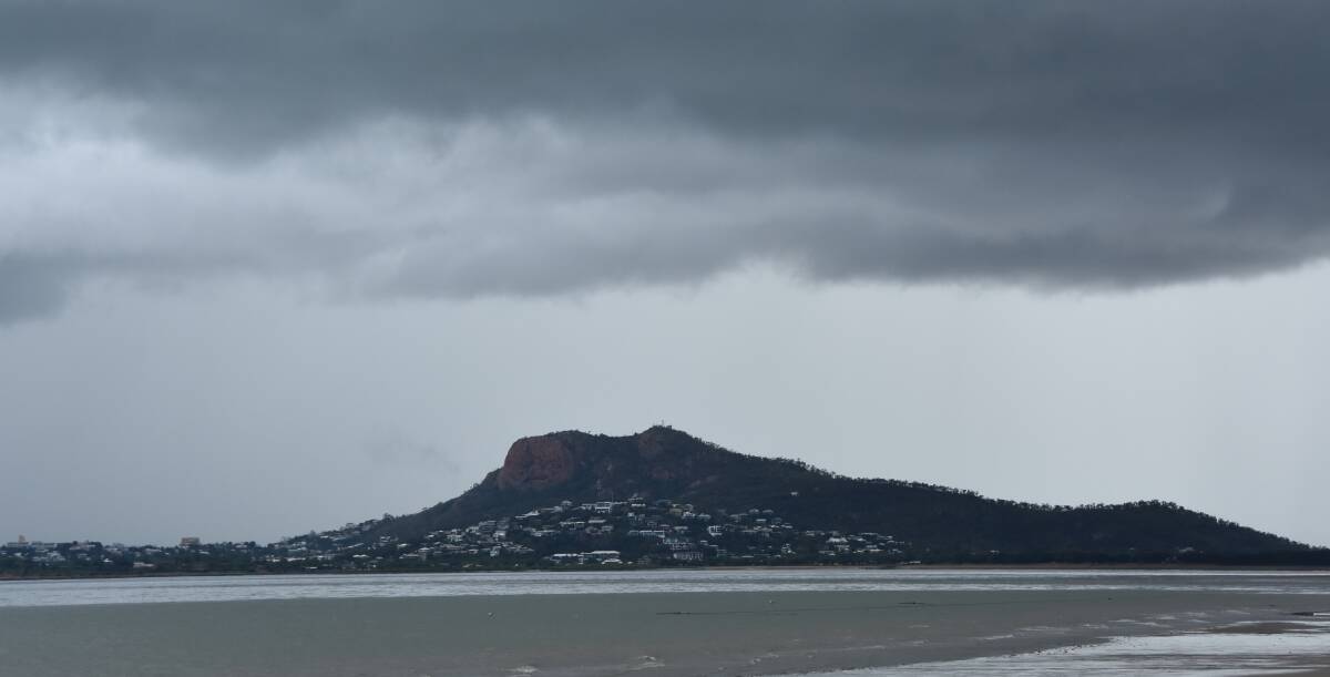 Dark clouds loom over Townsville as a monsoon trough lingers in the North. Picture: Jessica Johnston.